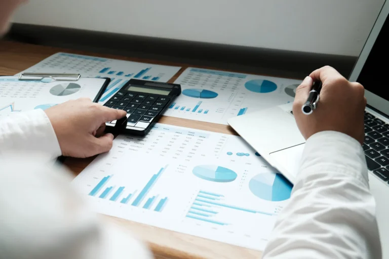 Accounting Services Burnaby professional reviewing startup business finances in a modern office.